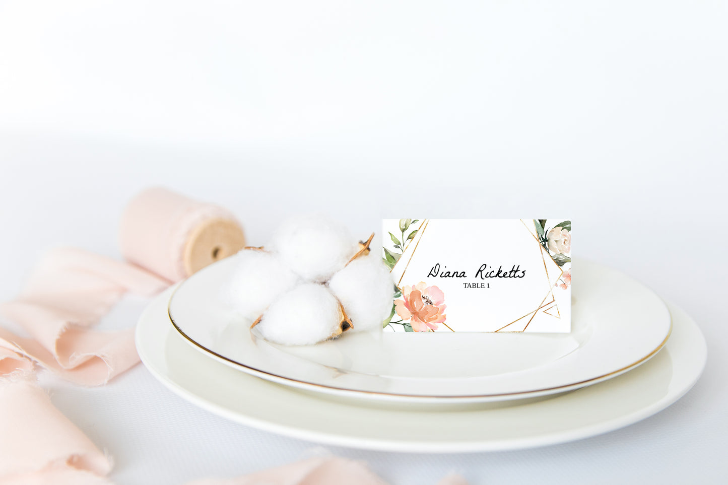 Pink flowers and leaves place card template.