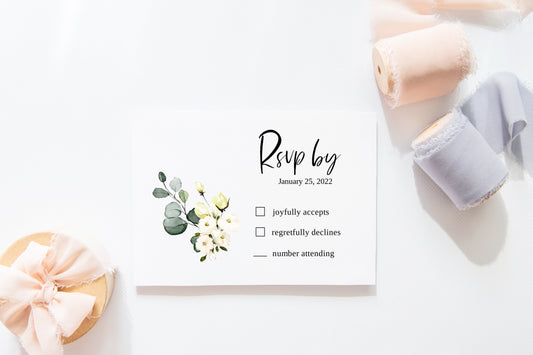 Editable RSVP card template with white flowers and eucalyptus graphic